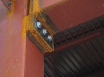 Secure fixings for secondary steel connections