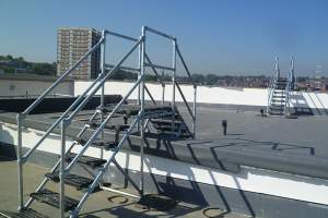 Bespoke roof step overs for an apartment development