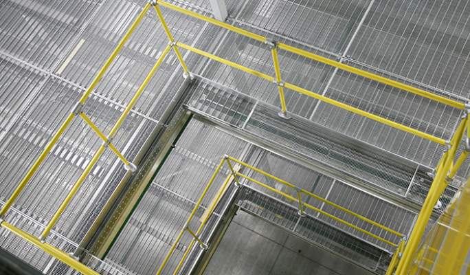 Warehouse guardrails constructed from KEE KLAMP fittings