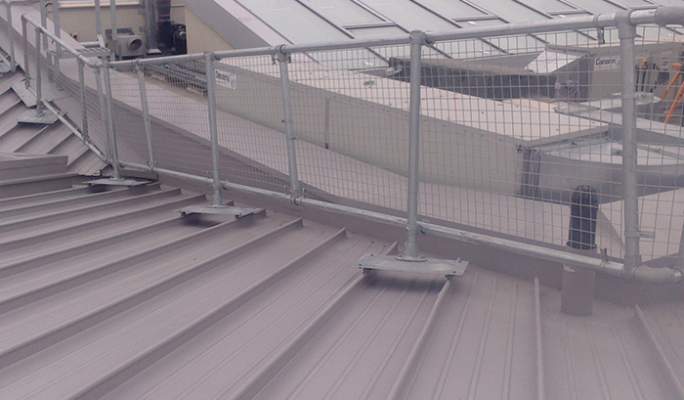 Metal roof guardrail system