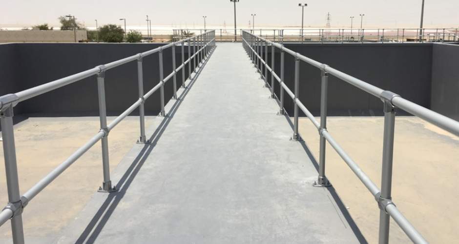 Anodised aluminium guardrail on a sewage plant from Abu Dhabi Sewerage Services Company.