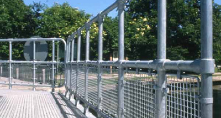 Kee Klamp handrail with mesh infill panels